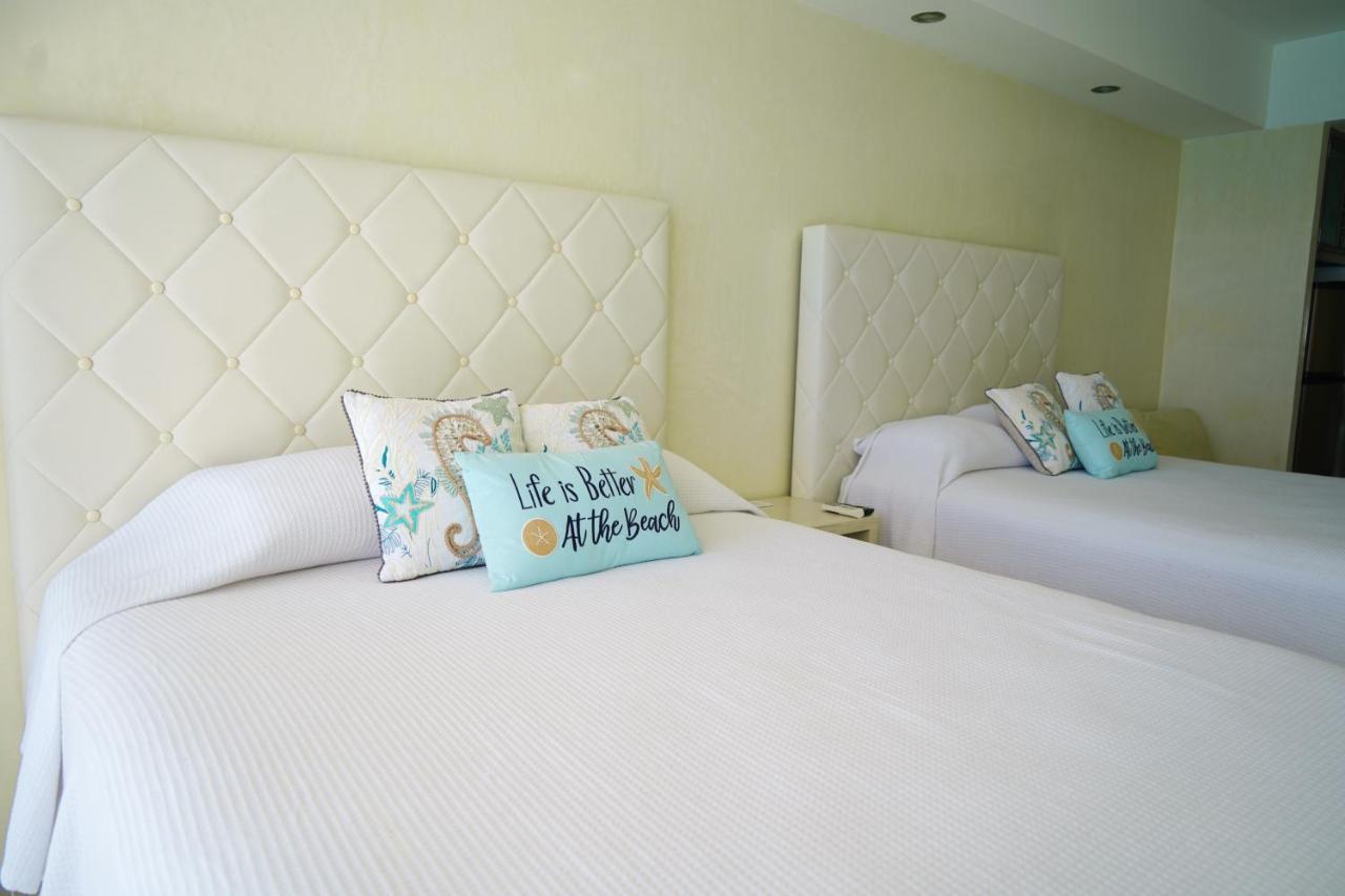Luxury Caribbean Condos By Salvia Cancun Beachfront מראה חיצוני תמונה