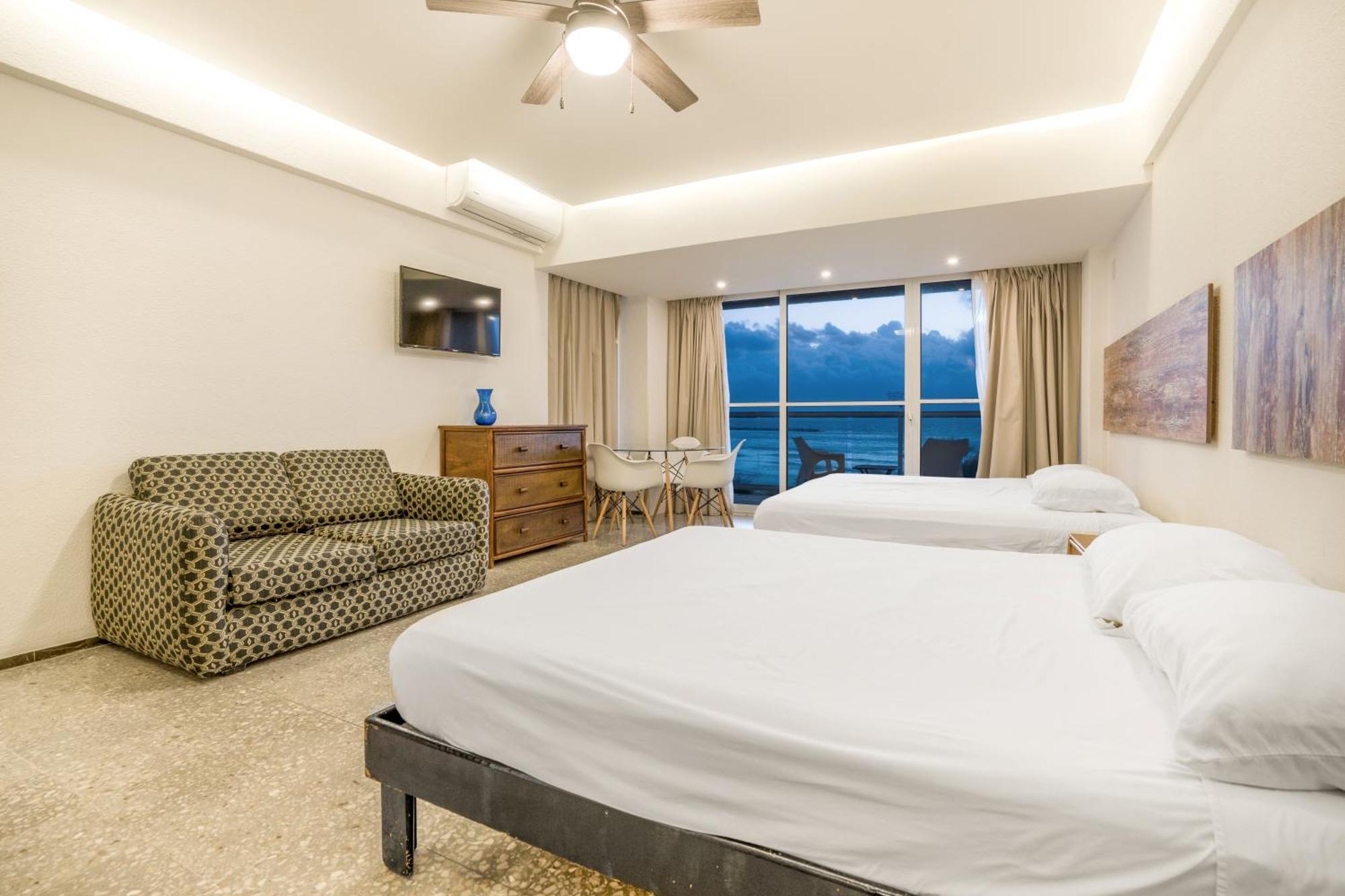 Luxury Caribbean Condos By Salvia Cancun Beachfront מראה חיצוני תמונה